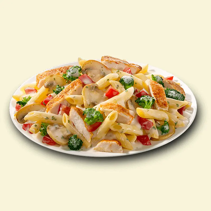 Creamy pasta tossed with tender chicken pieces.